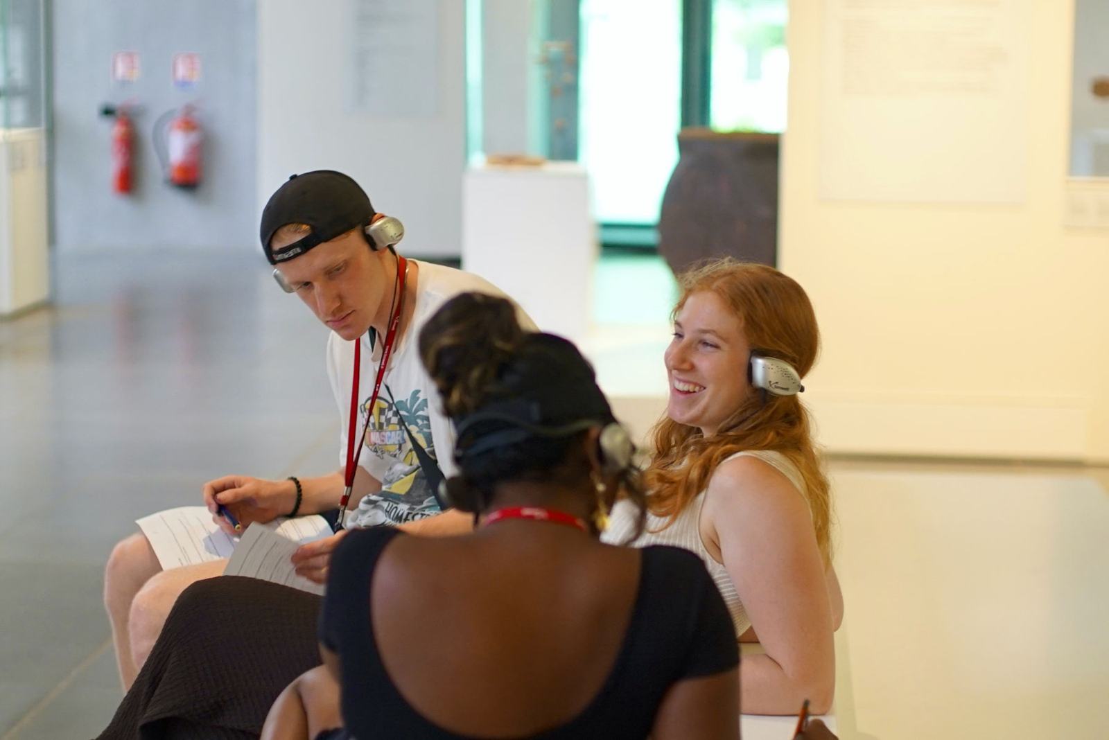 Students on a museum visit with audio guides
